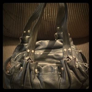 B. Makowsky black handbag